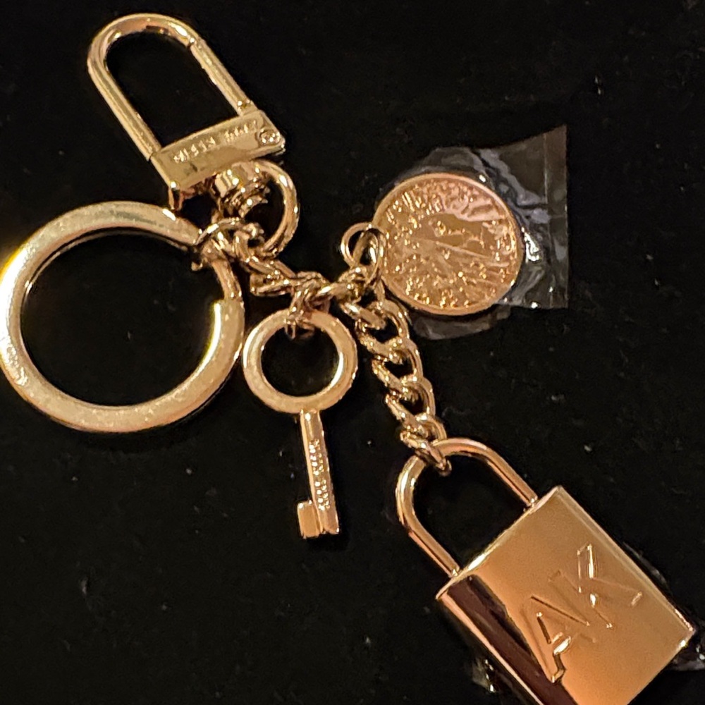 Anne Klein Gold Keychain with Lock and Coin Bag Charm
